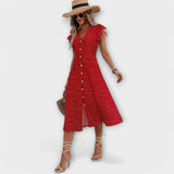 Vestido midi elegante con lunares