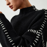 Alma | Suéter oversize de cuello alto en piqué con detalles