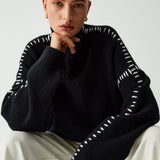 Alma | Suéter oversize de cuello alto en piqué con detalles